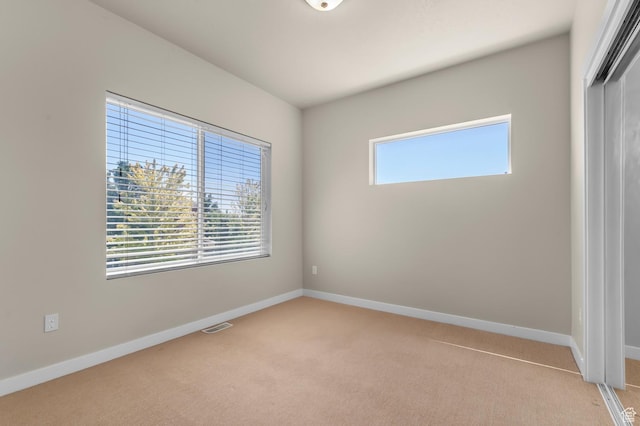 1012 W Willow Wind Dr, Farmington, UT 84025 - unfurnished bedroom with light colored carpet and a closet