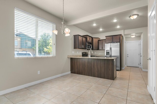 1012 W Willow Wind Dr, Farmington, UT 84025 - kitchen with appliances with stainless steel finishes, a peninsula, dark brown cabinets, light tile patterned floors, and recessed lighting