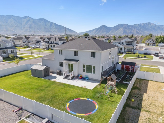 1346 W 1250 S, Springville, UT 84663 - back of house featuring a shed, a patio area, a fenced backyard, and a residential view