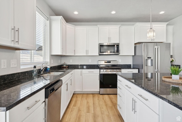 1346 W 1250 S, Springville, UT 84663 - kitchen with appliances with stainless steel finishes, plenty of natural light, light wood-type flooring, white cabinetry, and recessed lighting