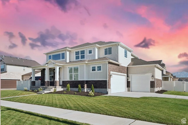 1346 W 1250 S, Springville, UT 84663 - view of front of home featuring stone siding, concrete driveway, and a garage