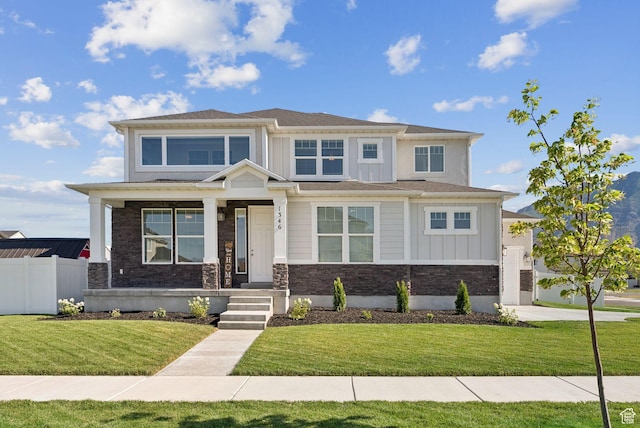1346 W 1250 S, Springville, UT 84663 - view of front of house featuring board and batten siding, stone siding, and concrete driveway