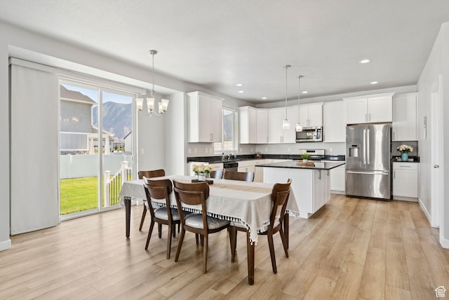 1346 W 1250 S, Springville, UT 84663 - dining space featuring light wood-style flooring, recessed lighting, and a chandelier