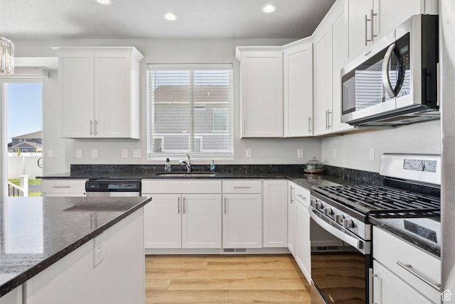 1346 W 1250 S, Springville, UT 84663 - kitchen featuring appliances with stainless steel finishes, white cabinets, recessed lighting, and plenty of natural light