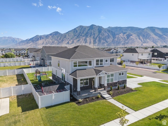 1346 W 1250 S, Springville, UT 84663 - view of front of home with a residential view, stone siding, roof with shingles, and a mountain view