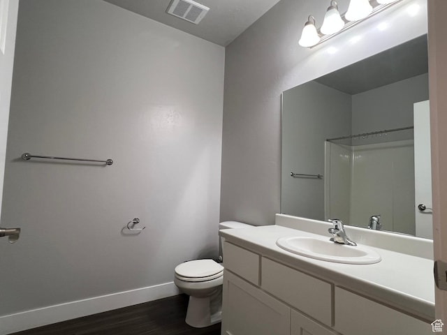 14652 S Astin Ln Unit U102, Herriman, UT 84096 - bathroom with vanity, wood finished floors, and a shower