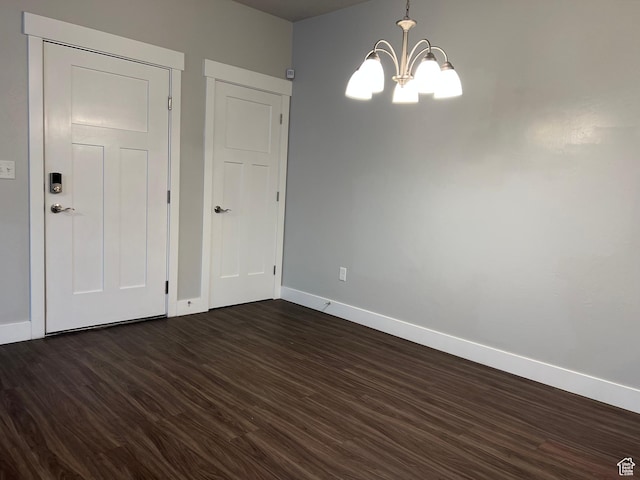 14652 S Astin Ln Unit U102, Herriman, UT 84096 - unfurnished dining area featuring a chandelier and dark wood-type flooring