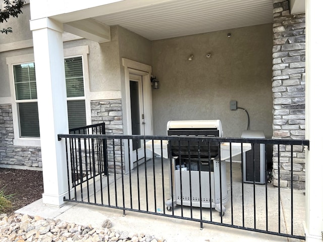 14652 S Astin Ln Unit U102, Herriman, UT 84096 - doorway to property with stone siding and stucco siding