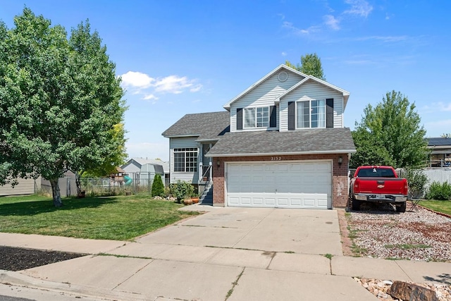 2132 W 2175 N, Clinton, UT 84015 - traditional-style home featuring brick siding, an attached garage, driveway, and a shingled roof