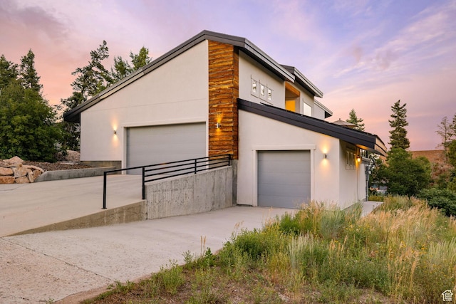 249 S Parkview Dr E, Park City, UT 84098 - view of front of property with a garage, stucco siding, and driveway