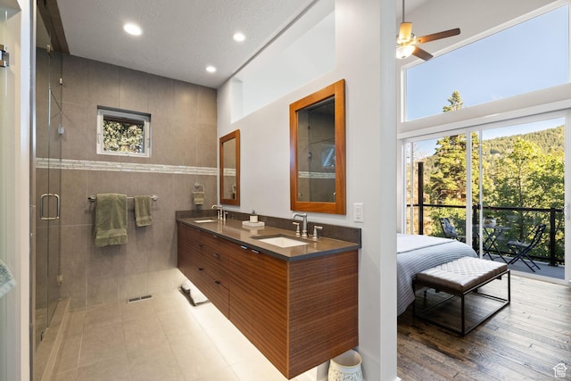 249 S Parkview Dr E, Park City, UT 84098 - full bath with recessed lighting, double vanity, a shower stall, and a ceiling fan