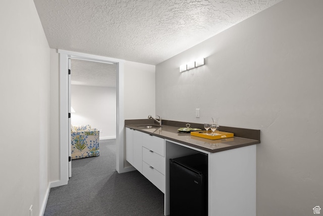 249 S Parkview Dr E, Park City, UT 84098 - bathroom featuring a sink and a textured ceiling