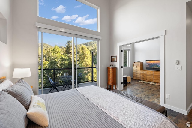 249 S Parkview Dr E, Park City, UT 84098 - bedroom with wood finished floors and a towering ceiling