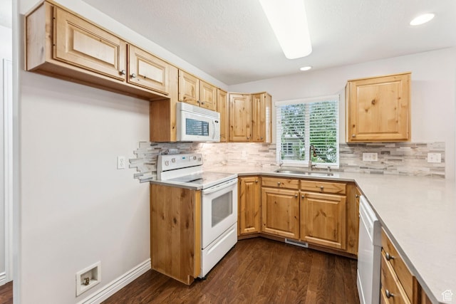 631 E Clearwater Dr, Layton, UT 84041 - kitchen with white appliances, dark wood-style flooring, decorative backsplash, and recessed lighting