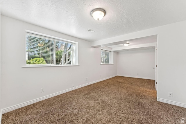 631 E Clearwater Dr, Layton, UT 84041 - empty room with carpet floors and a textured ceiling