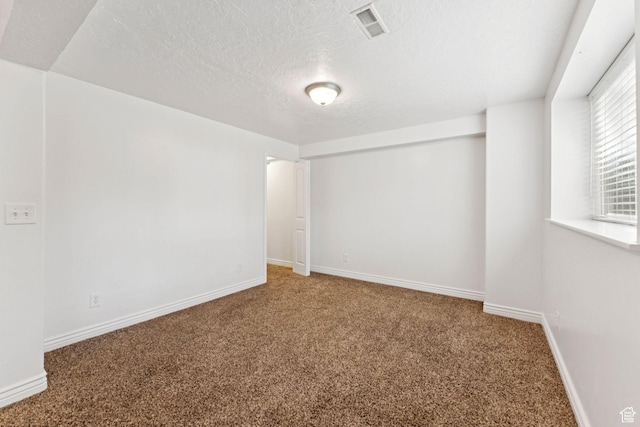 631 E Clearwater Dr, Layton, UT 84041 - carpeted empty room featuring a textured ceiling and baseboards