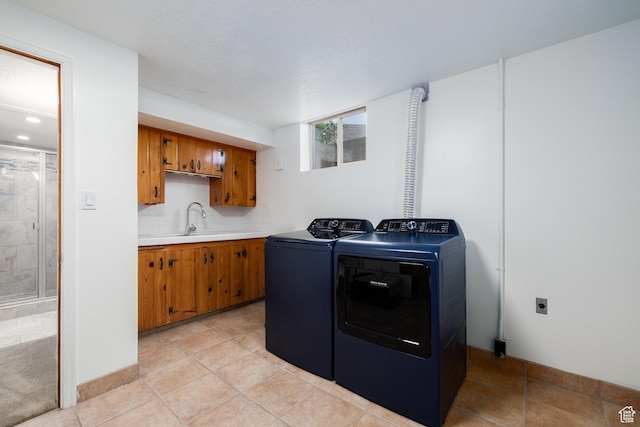 2400 E Logan Way S, Salt Lake City, UT 84108 - laundry area with washer and clothes dryer and light tile patterned floors