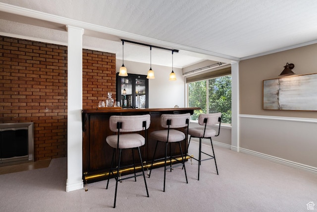 2400 E Logan Way S, Salt Lake City, UT 84108 - indoor dry bar with light carpet, decorative light fixtures, and crown molding