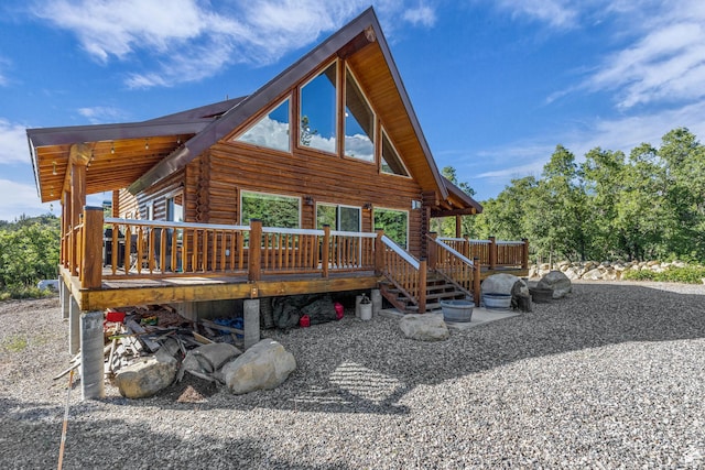 14961 N 12740 E, Mount Pleasant, UT 84647 - back of property featuring log siding and a deck