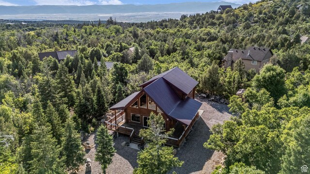 14961 N 12740 E, Mount Pleasant, UT 84647 - aerial view of property and surrounding area featuring a heavily wooded area and a mountain backdrop