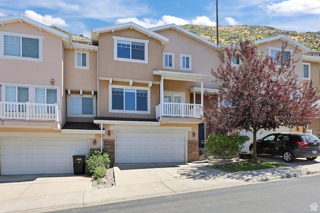 1339 Alpine Way, Provo, UT 84606 - multi unit property featuring stucco siding, a garage, driveway, and stone siding