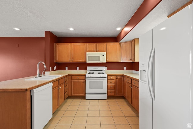 1339 Alpine Way, Provo, UT 84606 - kitchen featuring white appliances, light countertops, a peninsula, light tile patterned floors, and a textured ceiling