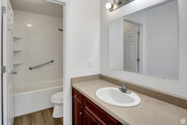 8048 W Copperfield Pl # 31, Magna, UT 84044 - full bathroom with vanity, wood finished floors, and shower / bathtub combination