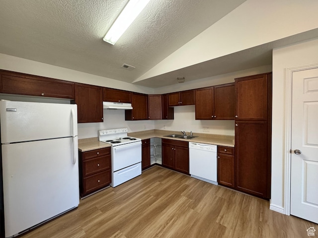 8048 W Copperfield Pl # 31, Magna, UT 84044 - kitchen with white appliances, under cabinet range hood, vaulted ceiling, light wood-style flooring, and light countertops