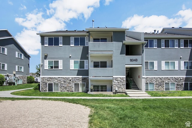 8048 W Copperfield Pl # 31, Magna, UT 84044 - view of building exterior featuring stairway