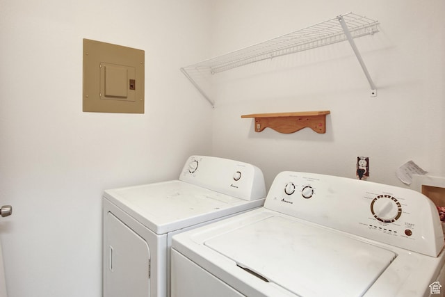 8048 W Copperfield Pl # 31, Magna, UT 84044 - washroom featuring electric panel and separate washer and dryer