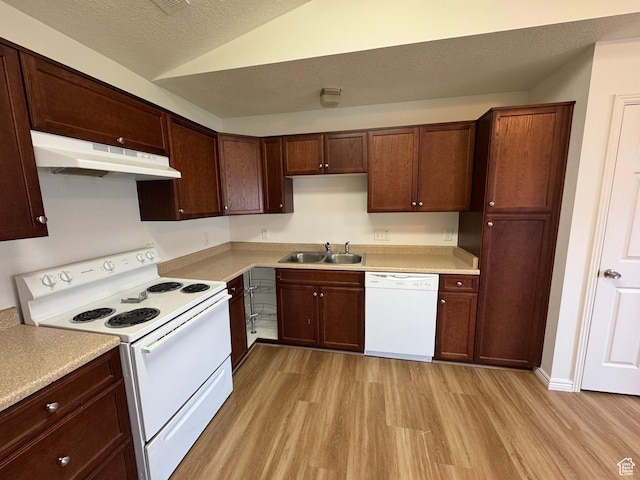 8048 W Copperfield Pl # 31, Magna, UT 84044 - kitchen with white appliances, under cabinet range hood, light wood-style floors, light countertops, and lofted ceiling