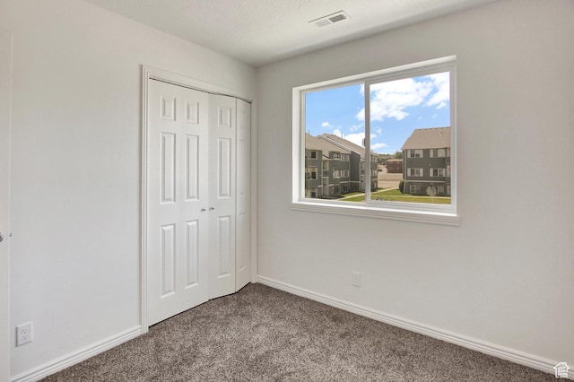 8048 W Copperfield Pl # 31, Magna, UT 84044 - unfurnished bedroom with carpet flooring and a closet