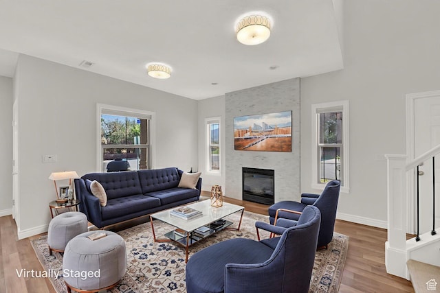 960 E 6740 S, Midvale, UT 84047 - living area featuring wood finished floors and a large fireplace