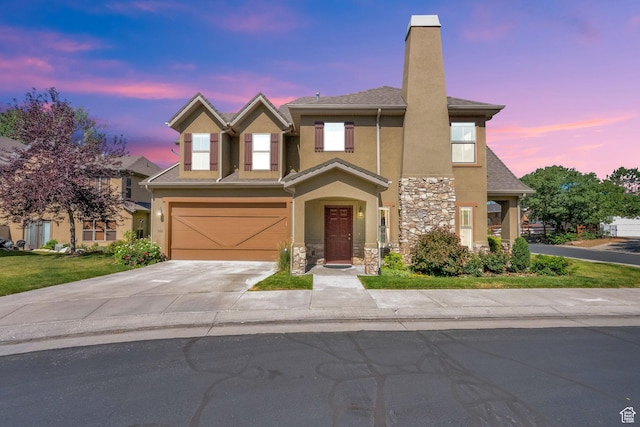 960 E 6740 S, Midvale, UT 84047 - view of front of property with stone siding, stucco siding, a chimney, and driveway