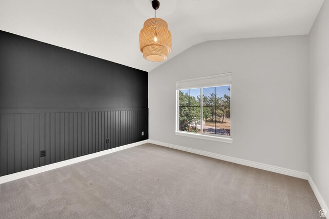 960 E 6740 S, Midvale, UT 84047 - unfurnished room with lofted ceiling, a wainscoted wall, and carpet floors