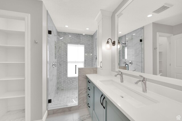 960 E 6740 S, Midvale, UT 84047 - bathroom featuring marble finish flooring, a marble finish shower, vanity, and recessed lighting
