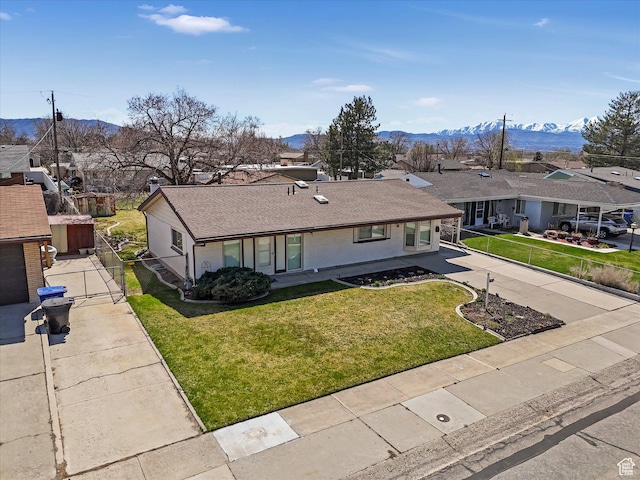 828 E Hibiscus Ave, Sandy, UT 84094 - ranch-style house with a mountain view, driveway, and roof with shingles
