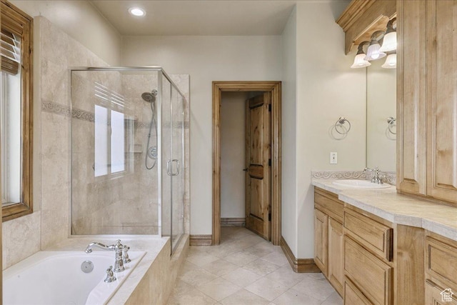 5588 S Farm Hill Dr, Salt Lake City, UT 84117 - full bathroom with a shower stall, vanity, a bath, and tile patterned flooring