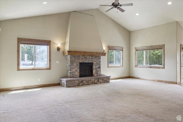 5588 S Farm Hill Dr, Salt Lake City, UT 84117 - unfurnished living room featuring high vaulted ceiling, carpet flooring, a ceiling fan, a stone fireplace, and recessed lighting