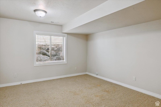 5588 S Farm Hill Dr, Salt Lake City, UT 84117 - empty room with carpet and a textured ceiling