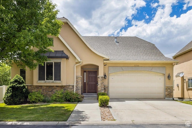 5588 S Farm Hill Dr, Salt Lake City, UT 84117 - view of front of home featuring stone siding, a garage, stucco siding, and concrete driveway