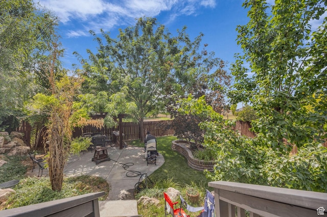 5548 S 3850 W, Roy, UT 84067 - fenced yard featuring a patio