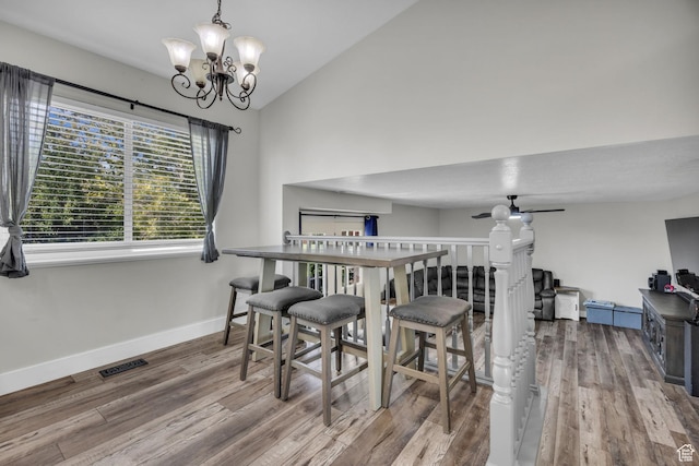 5548 S 3850 W, Roy, UT 84067 - dining room with wood finished floors, a chandelier, ceiling fan, and lofted ceiling