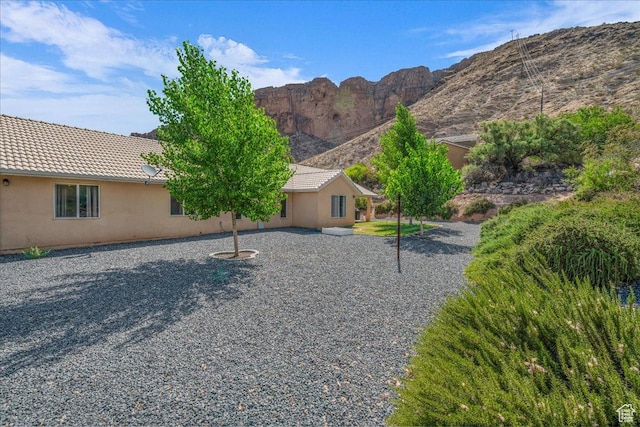 331 W 1910 S, Hurricane, UT 84737 - view of front of home with a mountain view, stucco siding, and a tile roof