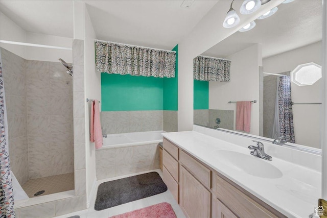 331 W 1910 S, Hurricane, UT 84737 - bathroom featuring tiled shower, vanity, a garden tub, and tile patterned flooring