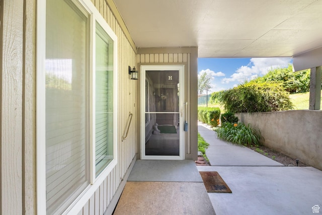 5704 S Waterbury Way Unit H, Murray, UT 84121 - doorway to property featuring board and batten siding