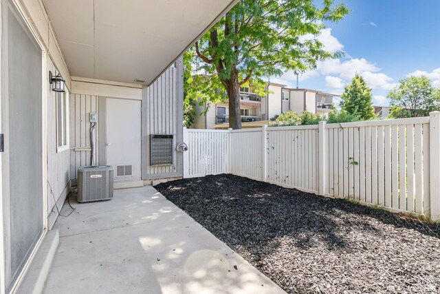5704 S Waterbury Way Unit H, Murray, UT 84121 - fenced backyard with a patio area and a residential view