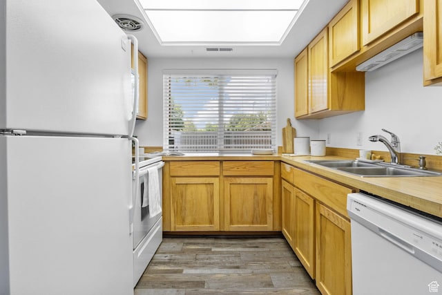 5704 S Waterbury Way Unit H, Murray, UT 84121 - kitchen with white appliances, light wood finished floors, and light countertops