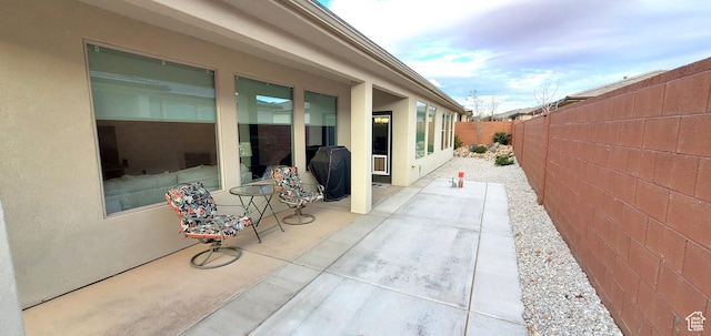 3040 E Lavatera Dr S, St George, UT 84790 - fenced backyard with a grill and a patio