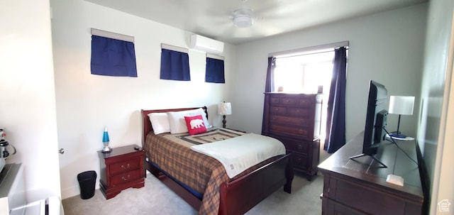 3040 E Lavatera Dr S, St George, UT 84790 - bedroom featuring an AC wall unit, light carpet, and ceiling fan